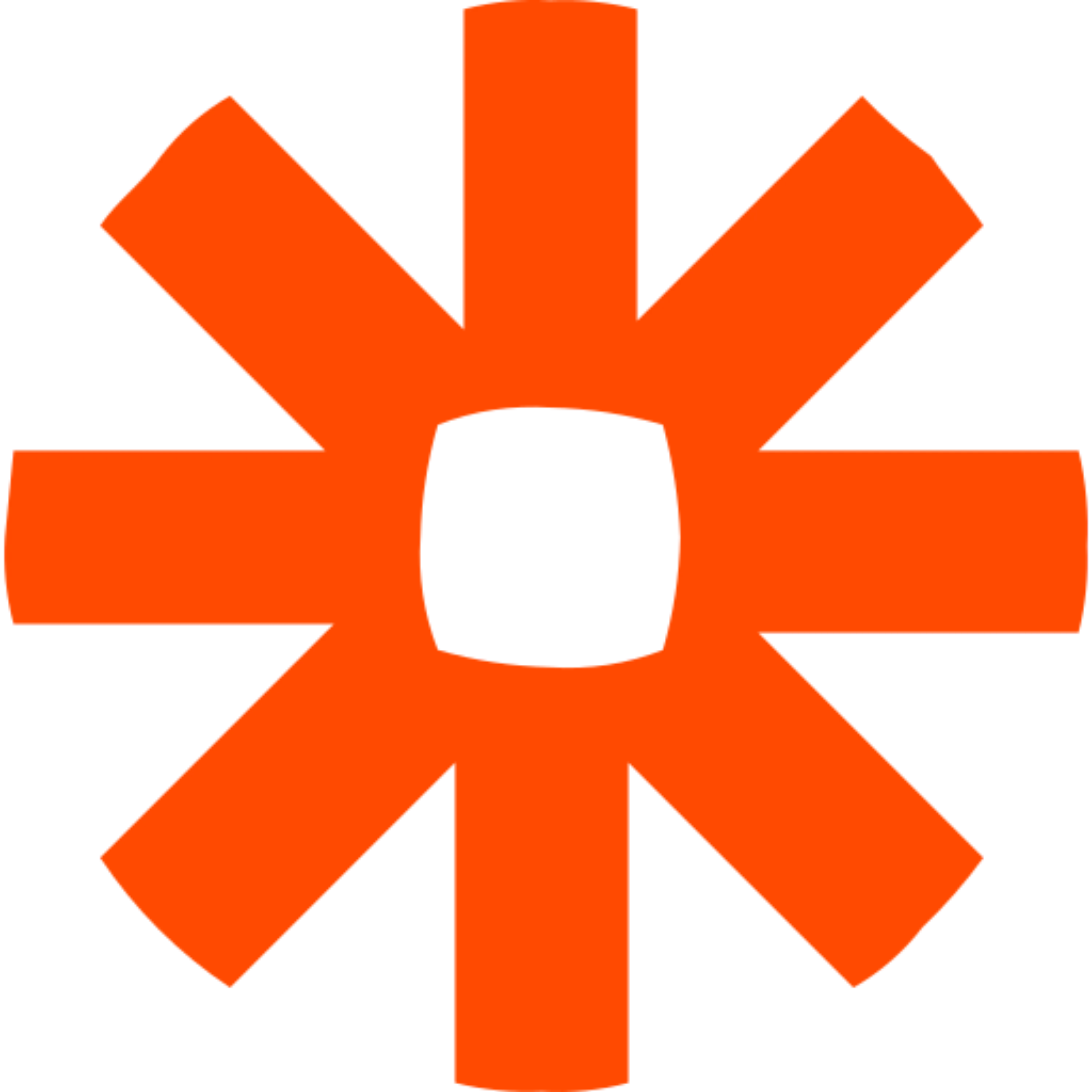Bright orange asterisk symbol with rounded rectangular arms on a black background.